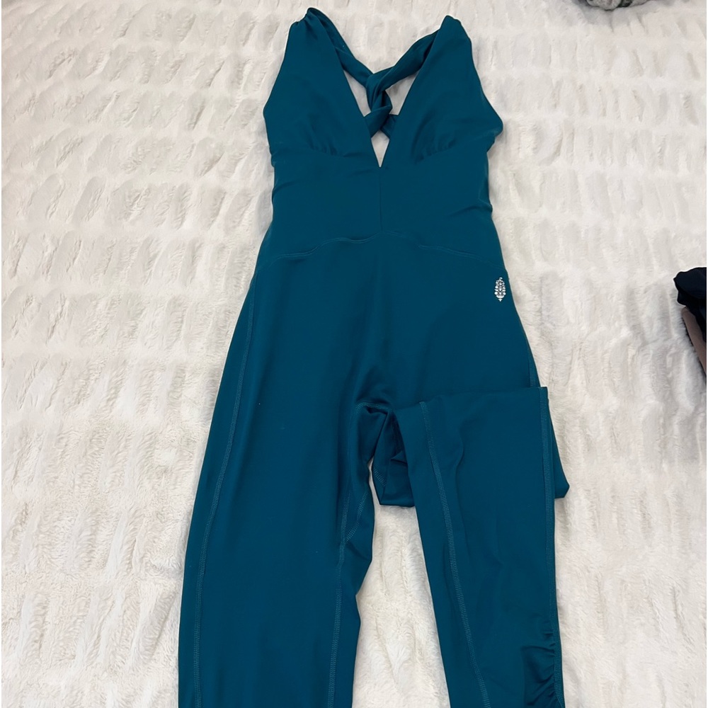Free people onesie in kind of a Cambridge blue size small,  flattering, so cute